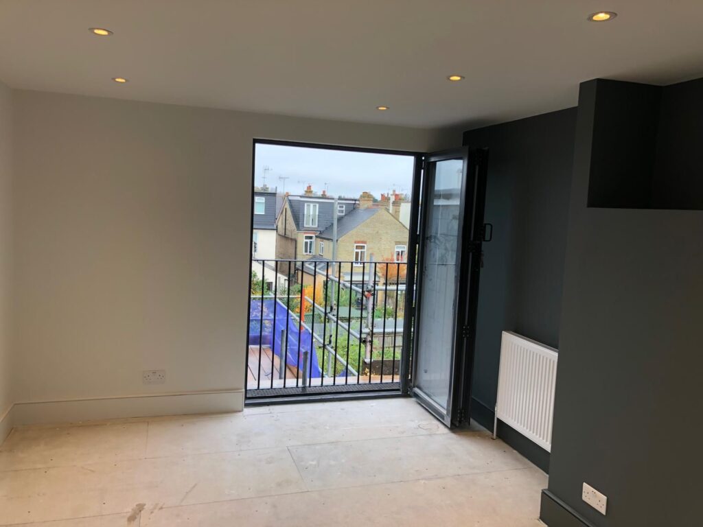 Chimney removal, ceiling removal, new ceiling, plaster, painting and new flooringin in East Ham