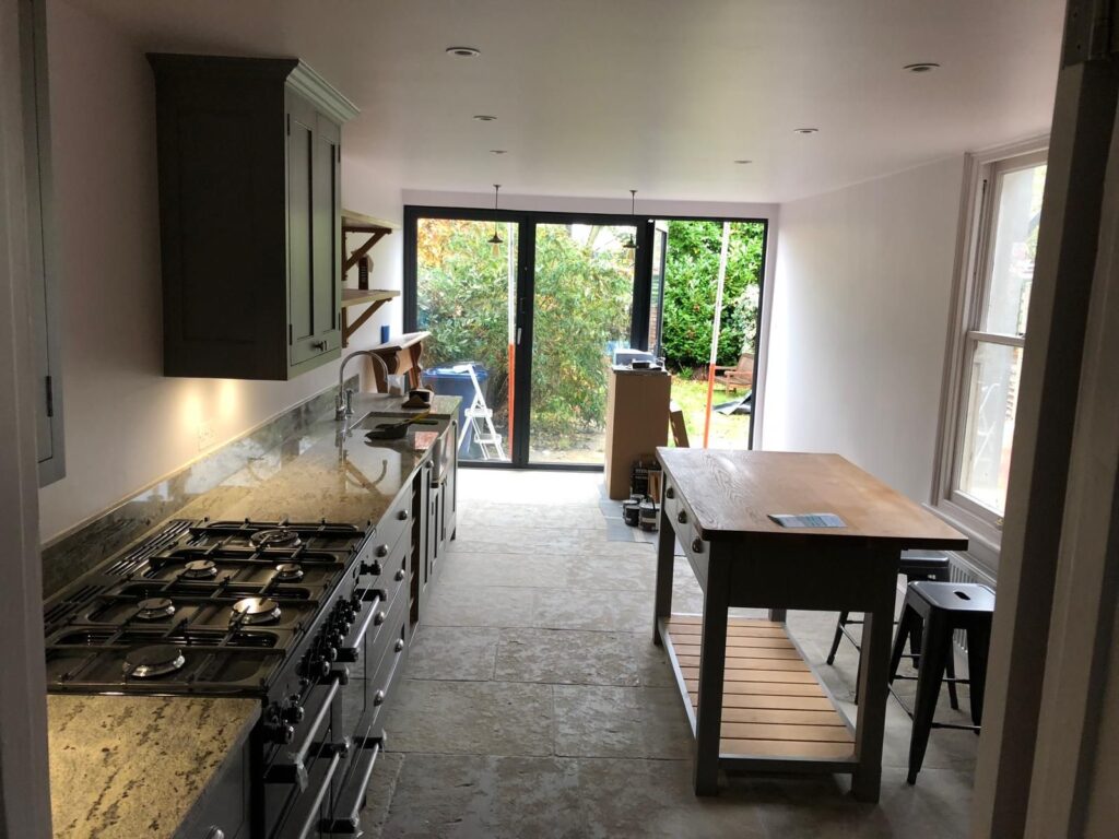 Chimney removal, ceiling removal, new ceiling, plaster, painting and new flooringin in East Ham