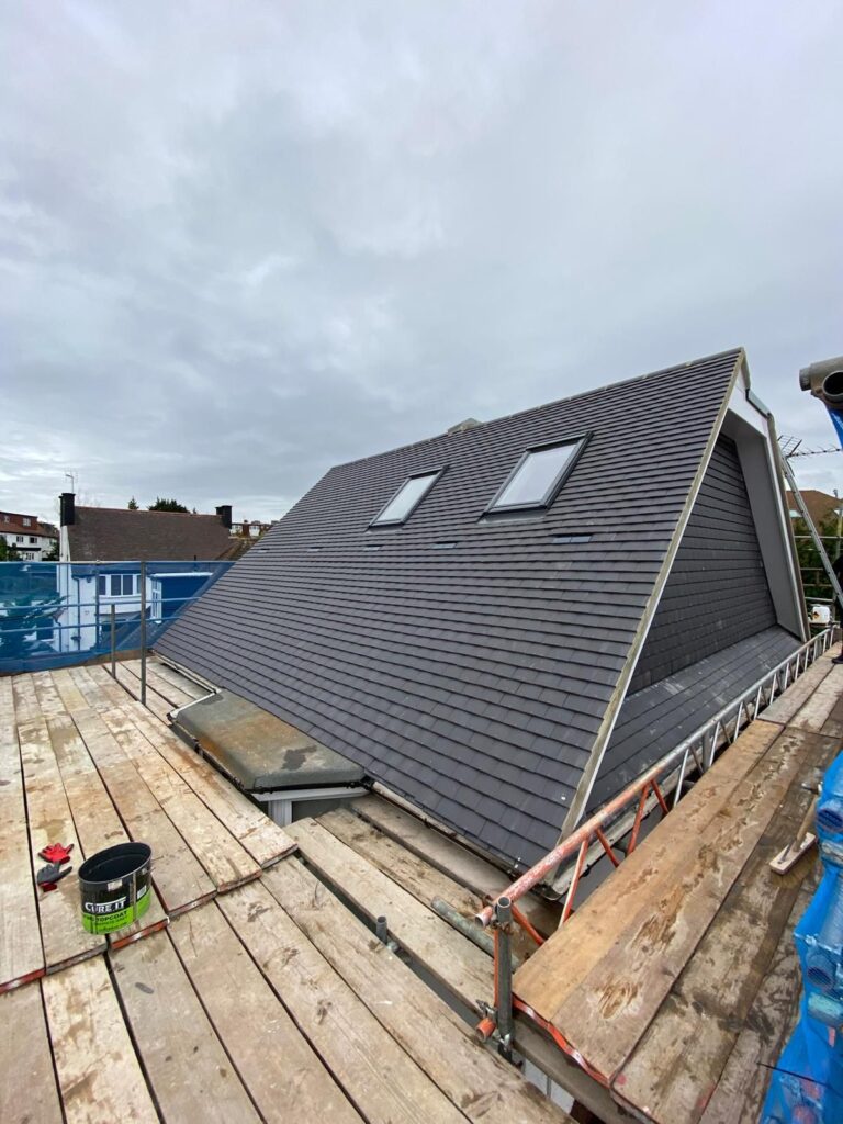 Chimney removal, ceiling removal, new ceiling, plaster, painting and new flooringin in East Ham