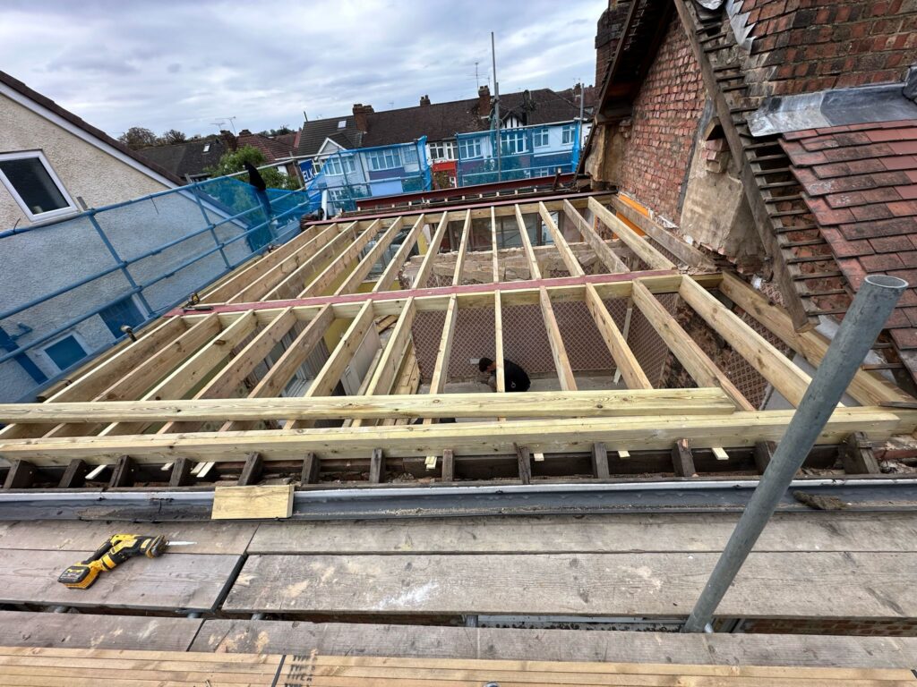 Chimney removal, ceiling removal, new ceiling, plaster, painting and new flooringin in East Ham