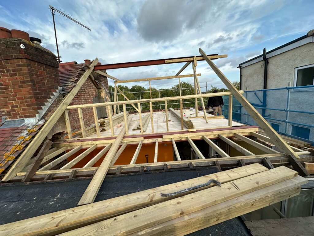 Chimney removal, ceiling removal, new ceiling, plaster, painting and new flooringin in East Ham