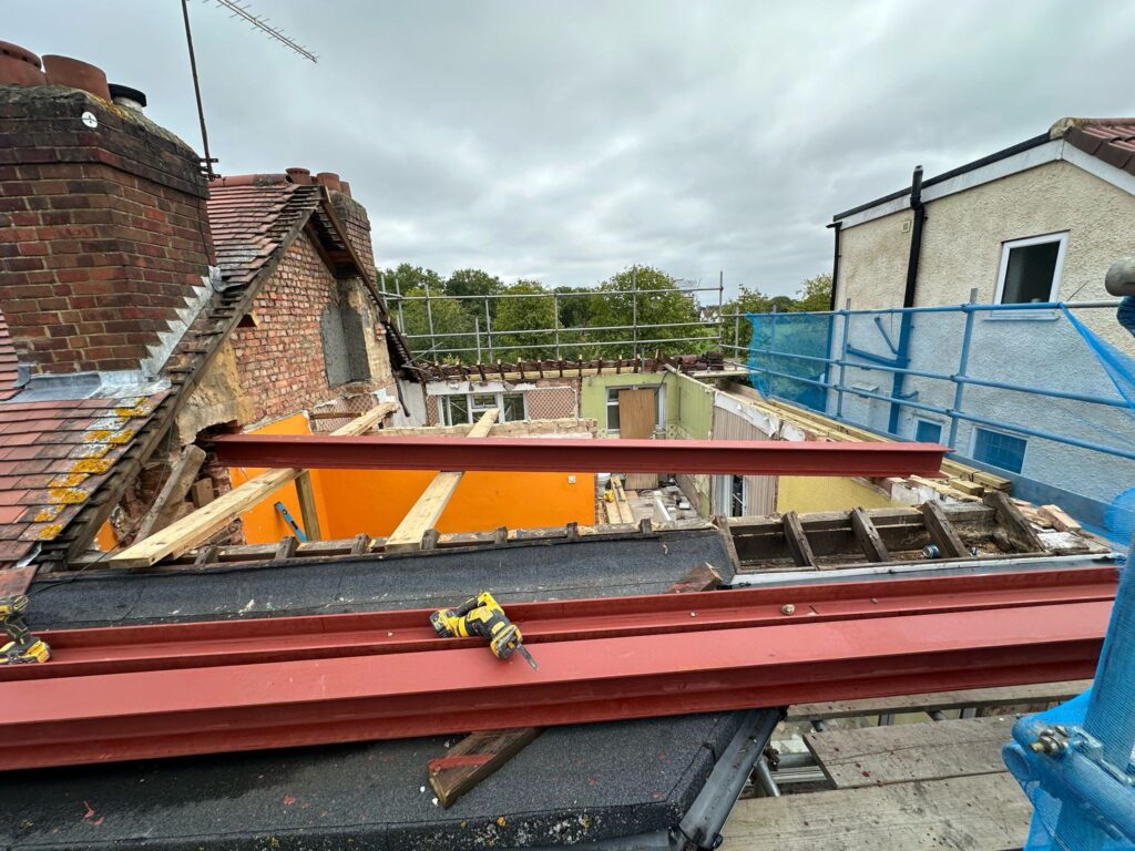 Chimney removal, ceiling removal, new ceiling, plaster, painting and new flooringin in East Ham