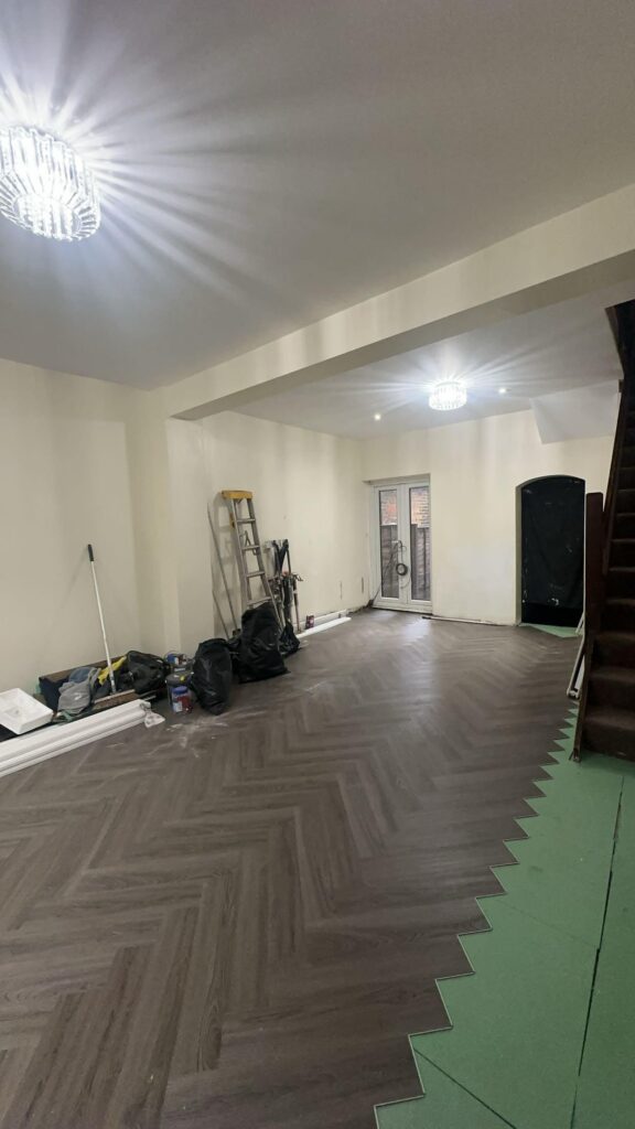 Chimney removal, ceiling removal, new ceiling, plaster, painting and new flooringin in East Ham